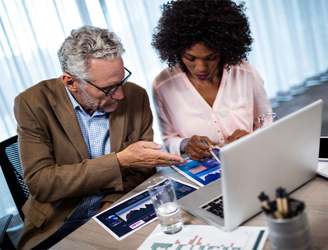 Business professionals working on IT solutions